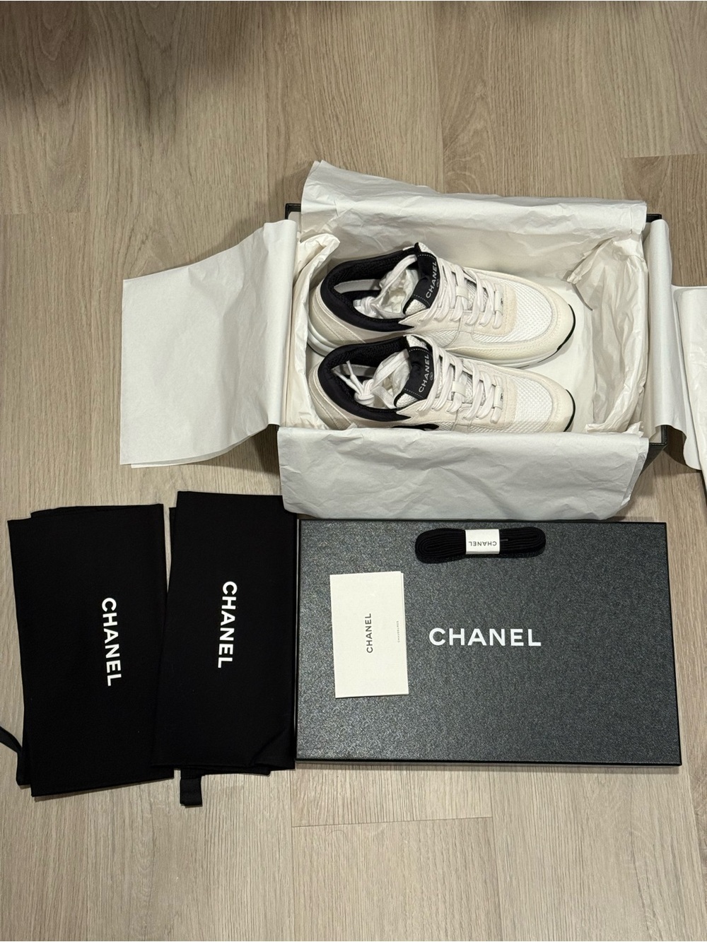 CHANEL Black and White CC Logo Trainer Sneakers - Picture 7 of 8
